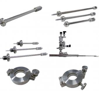 Sample Transfer Devices for HV and UHV Systems